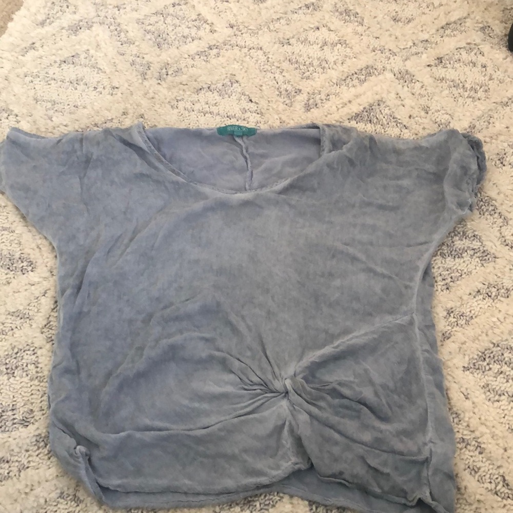 Cute sky blue top with a knot in the front